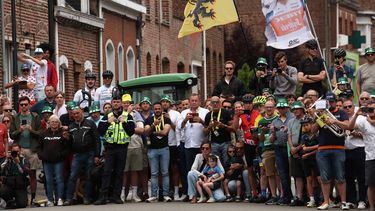 Spectators line the race route during the 1st stage of the 112th edition of the Tour de France cycling race, 184.9 km starting and finishing in Lille Metropole, northern France, on July 5, 2025. 
Anne-Christine POUJOULAT / AFP
