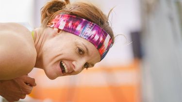 DEN HAAG - Jill Holterman na haar finish als eerste Nederlandse vrouw tijdens de CPC Loop in Den Haag. ANP MARCO DE SWART