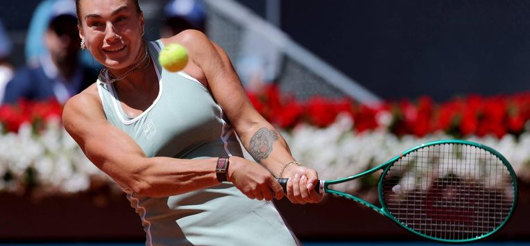 Belarus’ Aryna Sabalenka returns the ball to  Japan’s Naomi Osaka during their 2026 WTA Tour Madrid Open tennis tournament women's singles match at the Caja Magica in Madrid, on April 27, 2026.  
Thomas COEX / AFP