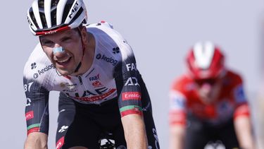 epa12355002 Portuguese rider Joao Almeida of UAE Team Emirates-XRG wins the 13th stage of La Vuelta a Espana cycling race, over 202.7km from
Cabezon de la Sal ot L'Angliru, northern Spain, 05 September 2025.  EPA/Javier Lizon