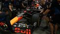 Team mechanics surround the car of Red Bull Racing's Dutch driver Max Verstappen during the second practice session ahead of the Formula One Singapore Grand Prix night race at the Marina Bay Street Circuit in Singapore on September 20, 2024. 
MOHD RASFAN / AFP