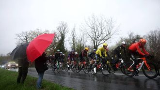 Lidl - Trek's Spanish rider Juan Ayuso, wearing the overall leader yellow jersey, rides with the pack during the 4th stage of the Paris-Nice cycling race, 195 km between Bourges and Uchon, on March 11, 2026. 
Anne-Christine POUJOULAT / AFP