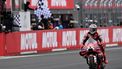 Ducati Lenovo Team rider Marc Marquez of Spain receives the checkered flag to win the MotoGP Japanese Grand Prix at the Mobility Resort Motegi in Motegi, Tochigi prefecture on October 4, 2026. 
Toshifumi KITAMURA / AFP