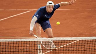 Netherlands' Tallon Griekspoor plays a backhand return to Germany's Alexander Zverev during their men's singles match on Court Philippe-Chatrier on day seven of the French Open tennis tournament at the Roland Garros Complex in Paris on June 1, 2024. 
Bertrand GUAY / AFP