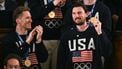 Goalie Connor Hellebuyck raises his gold medal as members of the US Men's Olympic hockey team are recogized by US President Donald Trump as he delivers the State of the Union address in the House Chamber of the US Capitol in Washington, DC, on February 24, 2026. 
ANDREW CABALLERO-REYNOLDS / AFP