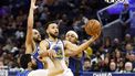 epa11054384 Golden State Warriors guard Stephen Curry (C) goes to the basket while drawing a foul by Orlando Magic center Goga Bitadze (L) as Orlando Magic guard Jalen Suggs (2-L) and Orlando Magic forward Paolo Banchero (R) defend during the second half of the NBA game between the Golden State Warriors and the Orlando Magic in San Francisco, California, USA, 02 January 2024.  EPA/JOHN G. MABANGLO SHUTTERSTOCK OUT