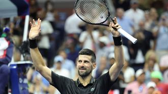 Serbia's Novak Djokovic celebrates after winning his men's singles first round tennis match against USA's Learner Tien on day one of the US Open tennis tournament at the USTA Billie Jean King National Tennis Center in New York City, on August 24, 2025. 
CHARLY TRIBALLEAU / AFP