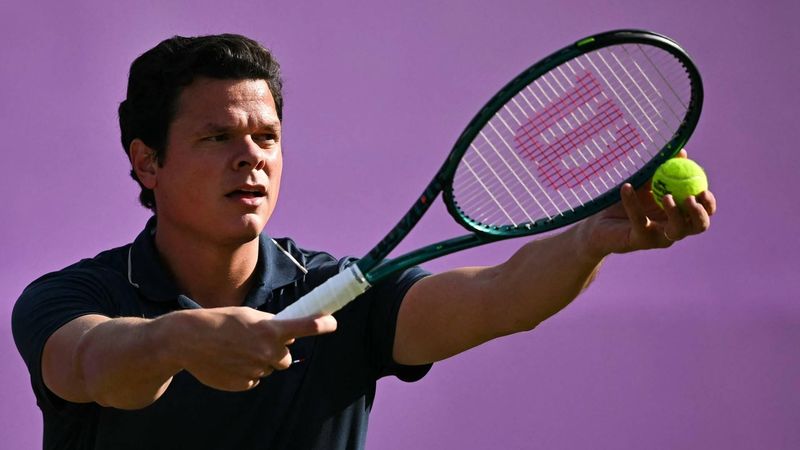 Canada's Milos Raonic prepares to serve against US player Taylor Fritz during their men's singles round of 16 match at the Cinch ATP tennis Championships at Queen's Club in west London on June 19, 2024. 
Ben Stansall / AFP