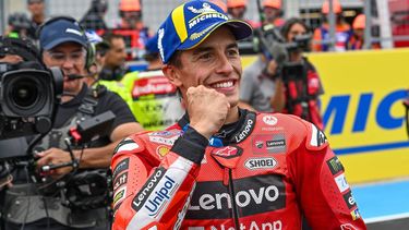 Ducati Lenovo Team's Spanish rider Marc Marquez celebrates his victory after the sprint race ahead of motorcycle Hungarian Moto GP Grand Prix at the Balaton Park circuit in Balatonfokajar, Hungary, on August 23, 2025.  
ATTILA KISBENEDEK / AFP
