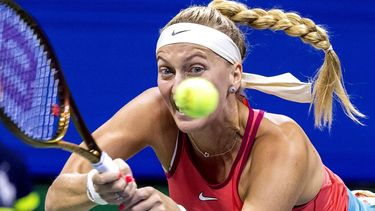 Czech Republic's Petra Kvitova plays a forehand return against Denmark's Caroline Wozniacki during the US Open tennis tournament women's singles second round match at the USTA Billie Jean King National Tennis Center in New York City, on August 30, 2023. 
COREY SIPKIN / AFP