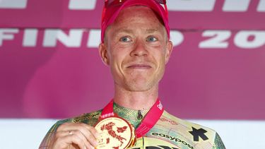 EF Education - EasyPost Danish rider Michael Valgren poses on the podium after winning the 17th stage of the Giro d'Italia 2026 - Tour of Italy cycling race between Cassano d'Adda and Andalo, Italy, on May 27, 2026. 
Luca Bettini / AFP