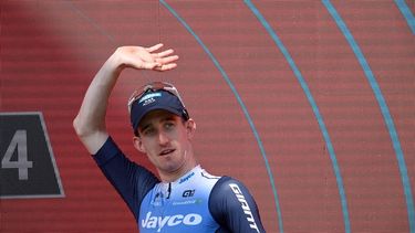 Team Jayco-AlUla's Eddie Dunbar celebrates on the podium winning the stage 11 of the Vuelta a Espana, a 166.5 km race between Padron and Padron, on August 28, 2024.   
MIGUEL RIOPA / AFP