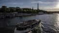 2023-09-06 20:23:59 A bateau mouche tourism boat cruises on the river Seine near the Eiffel Tower in Paris, on September 6, 2023. 
MIGUEL MEDINA / AFP