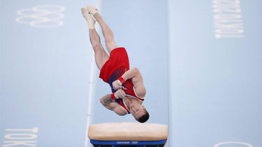 2021-08-02 19:29:45 epa09388146 Silver medalist Denis Abliazin of the Russian Olympic Committee competes for the Men's Vault Final at Artistic Gymnastics events of the Tokyo 2020 Olympic Games at the Ariake Gymnastics Centre in Tokyo, Japan, 02 August 2021.  EPA/TATYANA ZENKOVICH
