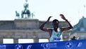 Ethiopia's Milkesa Mengesha crosses the finish line to win the 50th edition of the Berlin Marathon in Berlin, Germany on September 29, 2024. 
John MACDOUGALL / AFP