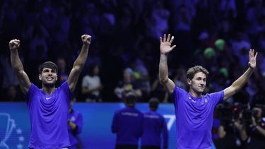 Spain's Carlos Alcaraz of Team Europe and Norway's Casper Ruud of Team Europe celebrate winning at the end of their 2024 Laver Cup men's doubles tennis match against USA's Frances Tiafoe of Team World and USA's Ben Shelton of Team World, in Berlin on September 22, 2024. 
Odd ANDERSEN / AFP