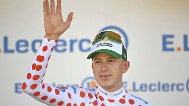 Caja Rural - Seguros RGA team's Dutch rider Alex Molenaar celebrates on the podium with the best climber's polka dot (dotted) jersey after the 2nd stage of the 113th edition of the Tour de France cycling race, 168,5 km between Tarragona and Barcelona in northeastern Spain, on July 5, 2026. 
Loic VENANCE / AFP