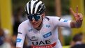 2023-07-23 19:33:29 UAE Team Emirates' Slovenian rider Tadej Pogacar wearing the best young rider's white jersey  gives a v-sign at the end of the 21st and final stage of the 110th edition of the Tour de France cycling race, 115 km between Saint-Quentin-en-Yvelines and the Champs-Elysees in Paris, on July 23, 2023. 
Thomas SAMSON / AFP