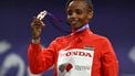Gold medallist Kenya's athlete Beatrice Chebet celebrates on the podium for the women's 5000m final during the World Athletics Championships in Tokyo on September 21, 2025. 
Philip FONG / AFP