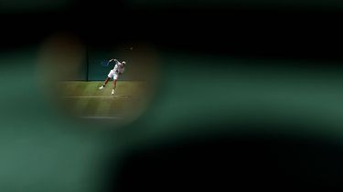Australia's Rinky Hijikata serves against Netherlands' Jesper de Jong during their men's singles first round tennis match on the second day of the 2026 Wimbledon Championships at The All England Lawn Tennis and Croquet Club in Wimbledon, southwest London, on June 30, 2026. 
Adrian Dennis / AFP