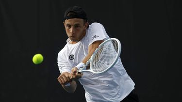 epa11086640 Tallon Griekspoor of the Netherlands in action against Arthur Fils of France during their Men's second round match at the Australian Open tennis tournament in Melbourne, Australia, 18 January 2024.  EPA/MAST IRHAM