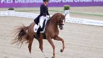 epa09461712 Charlotte Dujardin of Great Britain riding Gio performs in the Grand Prix Freestyle Individual competition during the FEI Dressage European Championship in Hagen am Teutoburger Wald, Germany, 11 September 2021.  EPA/FRIEDEMANN VOGEL