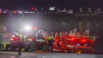epa11862689 Rescue teams stage to help search the Potomac River after a commercial airplane reportedly collided with a military helicopter on approach to Ronald Reagan National Airport in Washington, DC, USA, 29 January 2025. According to a preliminary statement from the United States Federal Aviation Administration (FAA), a PSA Airlines Bombardier CRJ700 regional jet that departed earlier today from Wichita, Kansas collided in midair with a Sikorsky H-60 helicopter while on approach to Reagan Washington National Airport.  EPA/SHAWN THEW