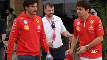 epa11745576 Spanish driver Carlos Sainz Jr (L) of Scuderia Ferrari and his teamate Monaco's driver Charles Leclerc (R) arrive at the paddock ahead of the Formula 1 Qatar Grand Prix in Lusail, Qatar, 28 November 2024. The Formula 1 Qatar Grand Prix will be held on 01 December 2024,  EPA/ALI HAIDER