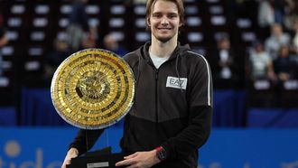 Kazakhstan's Alexander Bublik poses with his trophy after winning the final over Croatia's Borna Coric of the ATP World Tour in Montpellier, southern France, on February 4, 2024. 
Pascal GUYOT / AFP