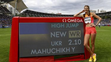 Yaroslava Mahuchikh poses after beating a world record in the women's high jump event during the 