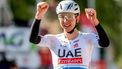 epa11291878 Slovenian rider Tadej Pogacar of UAE Team Emirates celebrates winning the Liege-Bastogne-Liege cycling race over 254.5 km, in Liege, Belgium, 21 April 2024.  EPA/Olivier Hoslet