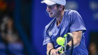 Netherlands' Botic van De Zandschulp hits a return to Italy's Matteo Berrettini during their men's singles match at the Japan Open tennis tournament at Ariake Coliseum in Tokyo on September 25, 2024. 
Yuichi YAMAZAKI / AFP