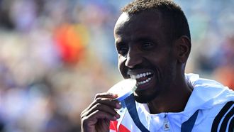 epa11541847 Silver medalist Bashir Abdi of Belgium poses for photos with his medal during a venue ceremony at Invalides following the Men's Marathon event of the Athletics competitions in the Paris 2024 Olympic Games in Paris, France, 10 August 2024.  EPA/CHRISTIAN BRUNA