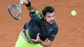 Switzerland's Stan Wawrinka serves to Britain's Andy Murray during their men's singles match on day one of The French Open tennis tournament on Court Philippe-Chatrier at The Roland Garros Complex in Paris on May 26, 2024. 
Alain JOCARD / AFP