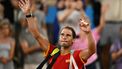 Spain's Rafael Nadal waves goodbye after he and Spain's Carlos Alcaraz  lose to US' Austin Krajicek and US' Rajeev Ram in their men's doubles quarter-final tennis match on Court Philippe-Chatrier at the Roland-Garros Stadium during the Paris 2024 Olympic Games, in Paris on July 31, 2024.  
CARL DE SOUZA / AFP