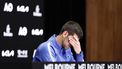 epa11105097 Novak Djokovic of Serbia reacts during a press conference after losing the Men's semi final match against Jannik Sinner of Italy at the Australian Open tennis tournament in Melbourne, Australia, 26 January 2024.  EPA/MAST IRHAM