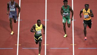 (From L) US' Courtney Lindsey, Jamaica's Oblique Seville, Nigeria's Israel Okon Sunday and Ghana's Abdul-Rasheed Saminu compete in the men's 100m semi-final during the World Athletics Championships in Tokyo on September 14, 2025. 
Philip FONG / AFP