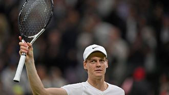 Italy's Jannik Sinner celebrates winning against Italy's Matteo Berrettini during their men's singles second round tennis match on the third day of the 2024 Wimbledon Championships at The All England Lawn Tennis and Croquet Club in Wimbledon, southwest London, on July 3, 2024. Sinner won the Match 7-6, 7-6, 2-6, 7-4. 
ANDREJ ISAKOVIC / AFP
