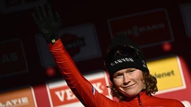 Third-placed Fenix - Deceuninck team's Dutch rider Puck Pieterse celebrate on the podium after competing in the Women's cyclocross elite race stage 7 of the UCI World Cup competition, in Gavere, on December 26, 2025. 
JASPER JACOBS / Belga / AFP