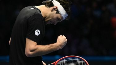 USA's Taylor Fritz celebrates a point against Russia's Daniil Medvedev during their match at the ATP Finals tennis tournament in Turin on November 10, 2024. 
Marco BERTORELLO / AFP