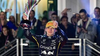 Red Bull Racing's Dutch driver Max Verstappen holds up the trophy on the podium after winning the Las Vegas Formula One Grand Prix at the Las Vegas Strip Circuit in Las Vegas, Nevada, on November 22, 2025. 
Frederic J. Brown / AFP