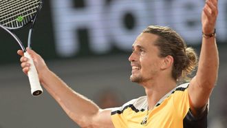 Germany's Alexander Zverev celebrates after winning against Denmark's Holger Rune at the end of their men's singles round of sixteen match on Court Philippe-Chatrier on day nine of the French Open tennis tournament at the Roland Garros Complex in Paris on June 4, 2024. 
Bertrand GUAY / AFP