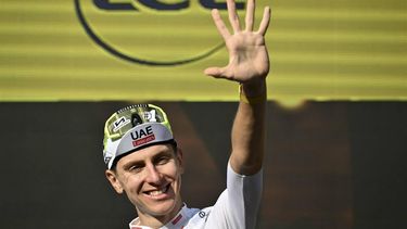 UAE Team Emirates team's Slovenian rider Tadej Pogacar celebrates on the podium after winning the 20th stage of the 111th edition of the Tour de France cycling race, 132,8 km between Nice and Col de la Couillole, southeastern France, on July 20, 2024. 
Marco BERTORELLO / AFP