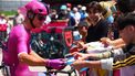 Team Lidl-Trek's Italian rider Jonathan Milan signs autographs prior the 11th stage of the 107th Giro d'Italia cycling race, 207km between Foiano di Val Fortore and Franca Villa al Mare, on May 15, 2024.  
Luca Bettini / AFP