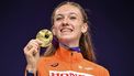 Gold medallist Netherlands' Femke Bol celebrate on the podium with her medal for the women's 400m hurdles final during the World Athletics Championships in Tokyo on September 20, 2025. 
Philip FONG / AFP