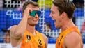 2023-08-04 19:13:10 epa10784735 Leon Luini (R) and Yorick De Groot (L) of the Netherlands celebrate after winning their Men’s Round of 16 match against Julian Hoerl and Alexander Horst of Austria at the CEV EuroBeachVolley 2023 European Beach Volleyball Championships in Vienna, Austria, 04 August 2023.  EPA/CHRISTIAN BRUNA