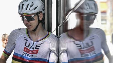 UAE Team Emirates - XRG team's Slovenian rider Tadej Pogacar casts a reflection as he disembarks his team bus during a training session two days prior to the start of the 113th edition of the Tour de France cycling race, in Castelldefels near Barcelona in northeastern Spain, on July 2, 2026. 
Jeff PACHOUD / AFP