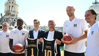 Maxima Roma's basket president Paul Matiasic (3rd L) and former AS Roma captain Francesco Totti and Maxima Roma’s new advisor (3rd R), pose for a picture after a press conference in Rome on September 8, 2026. Totti, who spent his entire playing career with AS Roma, joined Maxima Roma on September 1 as advisor to the ownership with responsibility for fan base development and corporate social responsibility. The club was created in June 2026 after US entrepreneur Paul Matiasic bought Pallacanestro Brescia's licence and relocated it to the Italian capital, and will play in the Italian Serie A and in the EuroCup
Alberto PIZZOLI / AFP
