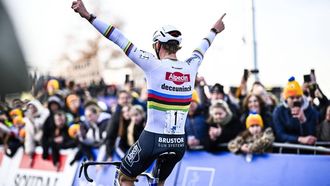 Alpecin-Deceuninck's Dutch Mathieu Van Der Poel celebrates as he crosses the finish line in the men elite race of the 'Plage Cross' cyclocross cycling event in Hofstade, stage 4/8 in the 