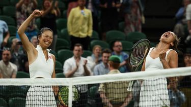 2023-07-16 22:28:14 Taiwan's Hsieh Su-wei (L) and Czech Republic's Barbora Strycova celebrtae beating Australia's Storm Hunter and Belgium's Elise Mertens, during their women's doubles final tennis match on the last day of the 2023 Wimbledon Championships at The All England Tennis Club in Wimbledon, southwest London, on July 16, 2023.  
Adrian DENNIS / AFP